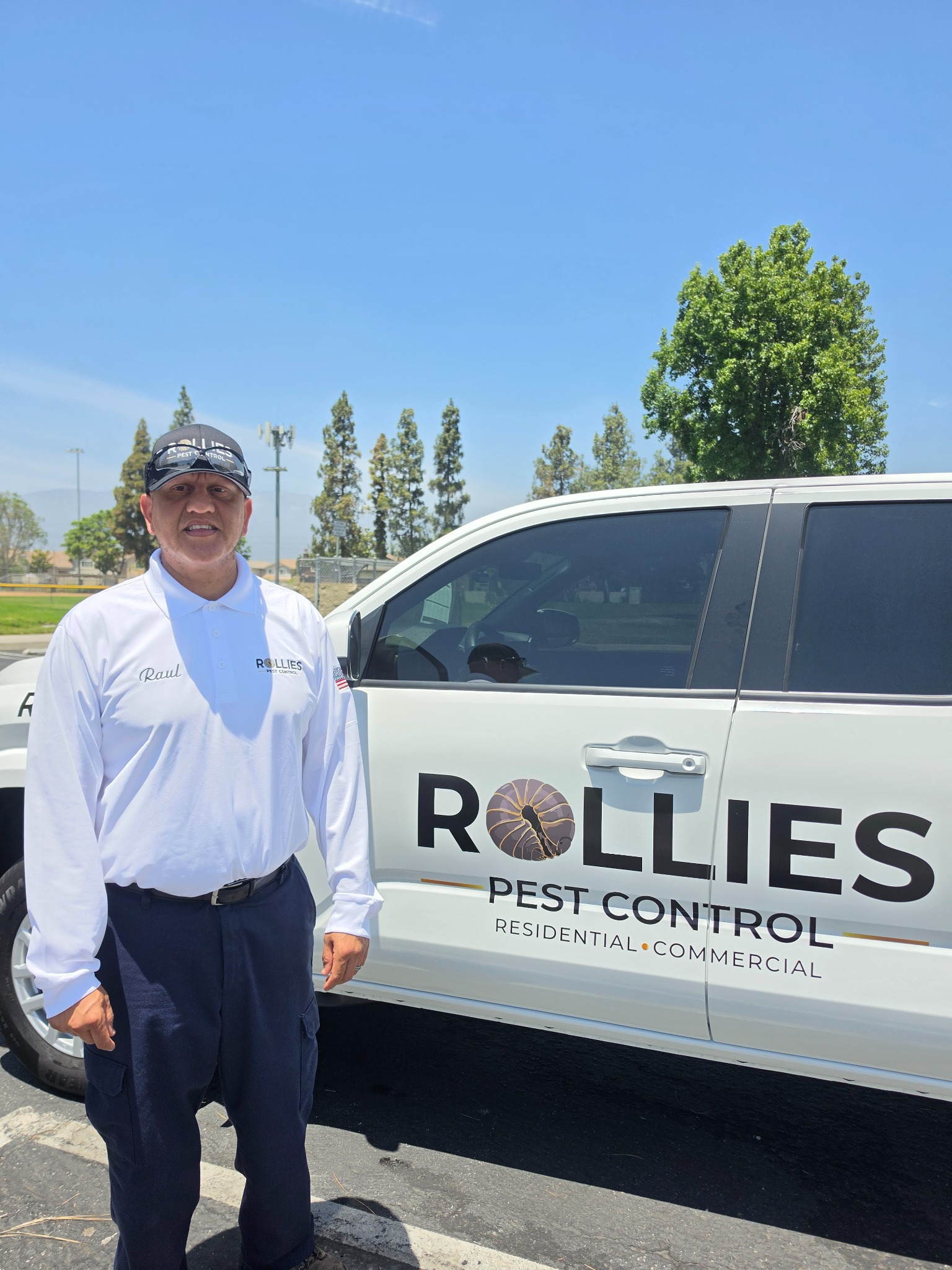 Raul with the Rollies Pest Control service truck